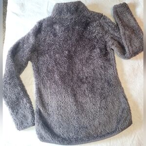 Women's/Juniors size small Fila sport zip up jacket.